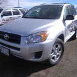Silver Toyota Rav 4 with Dented Doors