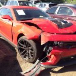 Side view of smashed camero